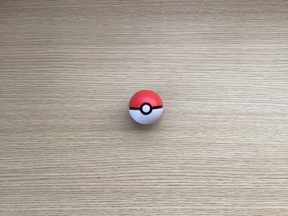 A Pokéball representing the dangers of a Pokémon Go car crash in New Jersey caused by distracted driving.