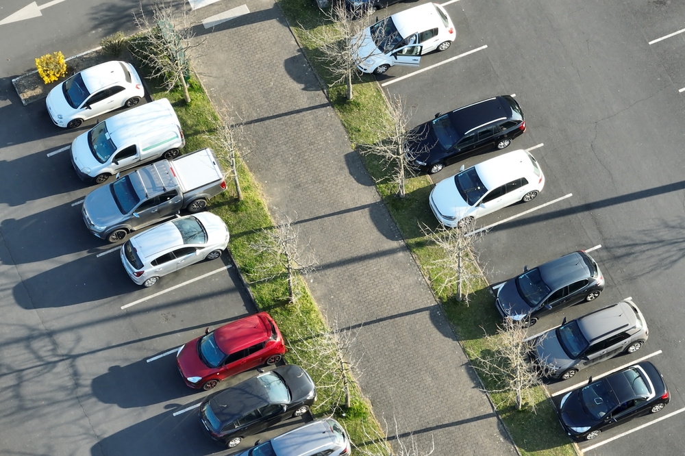 Aerial view of a busy parking lot, representing Black Friday traffic and crowded shopping-area conditions in New Jersey.