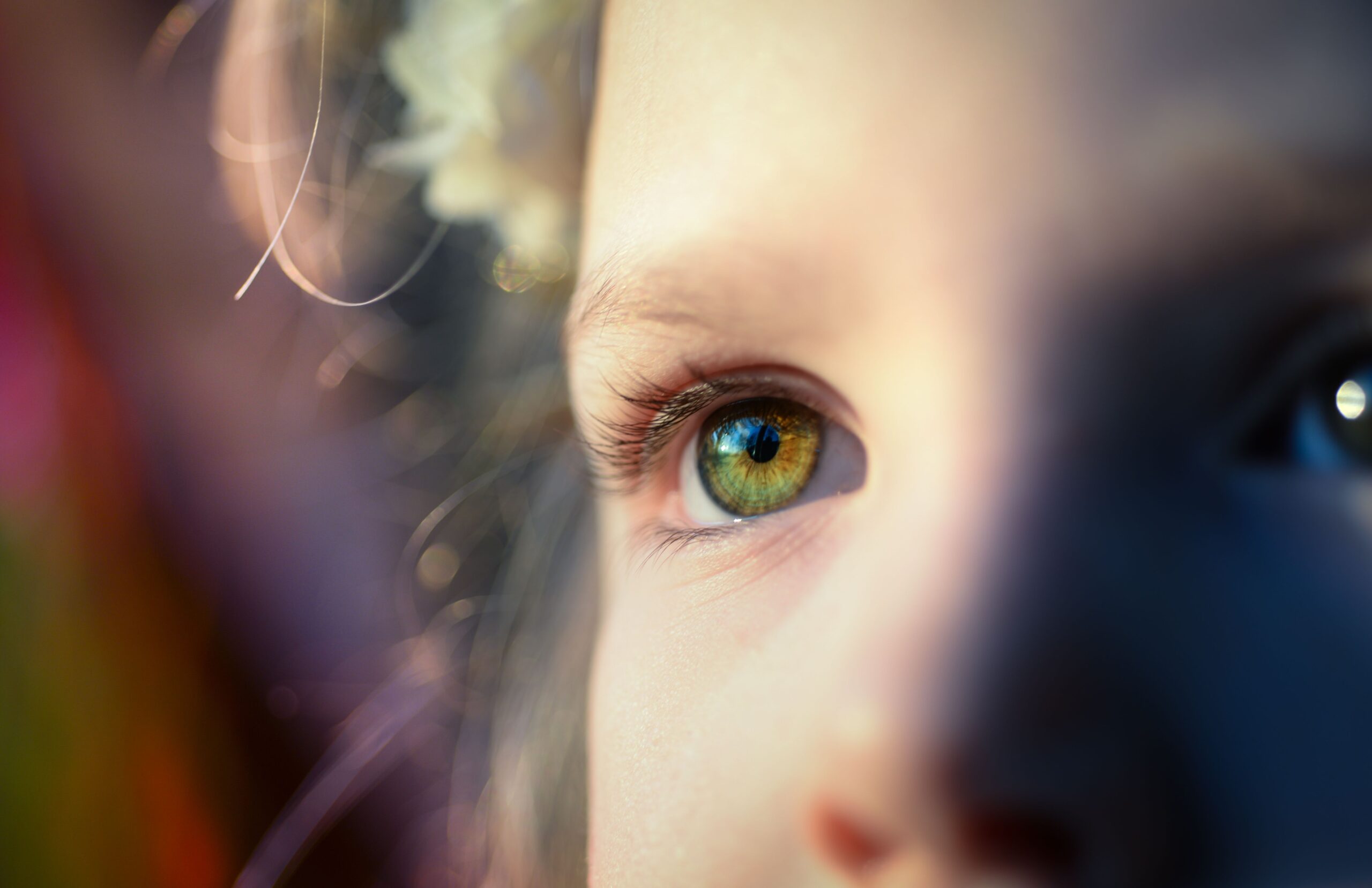 Close-up of a child's eye, highlighting the risk of a child eye injury after a New Jersey car accident.